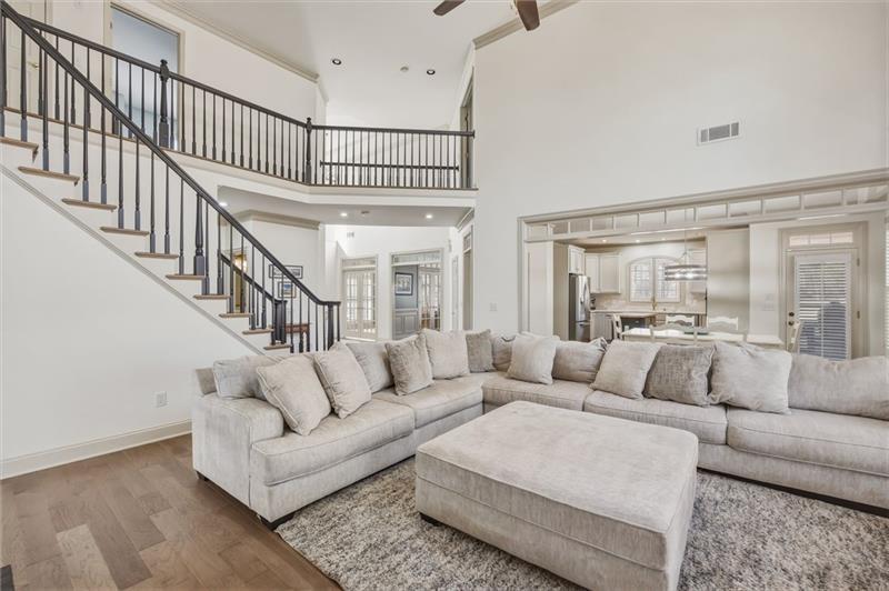 4862 Manatee Court Northwest Powder Springs, GA 30127 - Photo 14 of 46 a living room with furniture or stairs and a couch