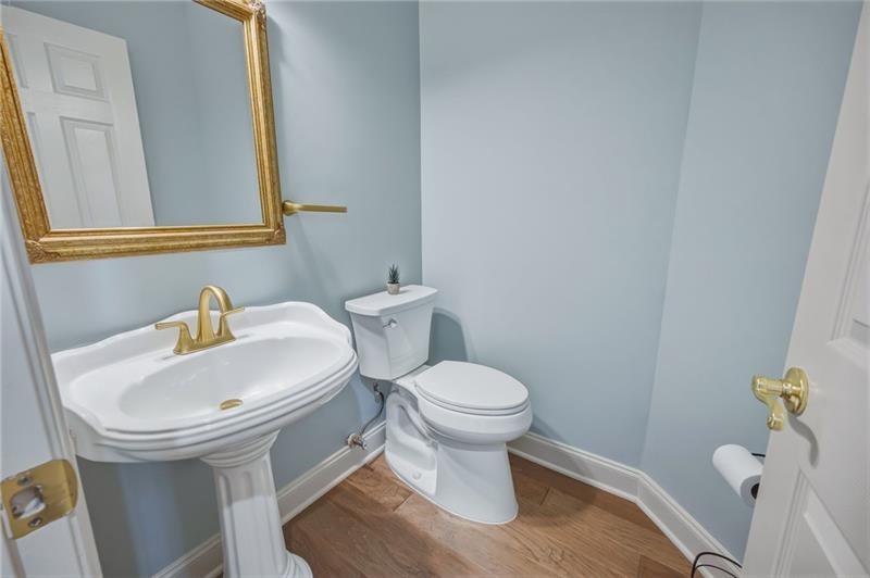 4862 Manatee Court Northwest Powder Springs, GA 30127 - Photo 22 of 46 a bathroom with a sink and a toilet
