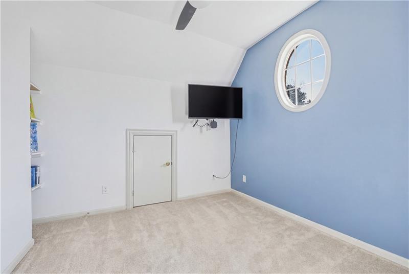 4862 Manatee Court Northwest Powder Springs, GA 30127 - Photo 37 of 46 an empty room with a fan and a window