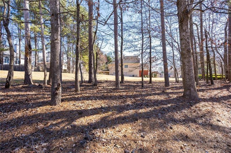 4862 Manatee Court Northwest Powder Springs, GA 30127 - Photo 43 of 46 a view of road with trees