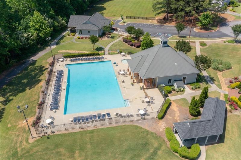 4862 Manatee Court Northwest Powder Springs, GA 30127 - Photo 44 of 46 an aerial view of a house with swimming pool and big yard