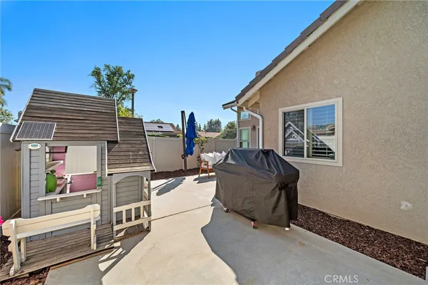 a view of a street with a building in the background