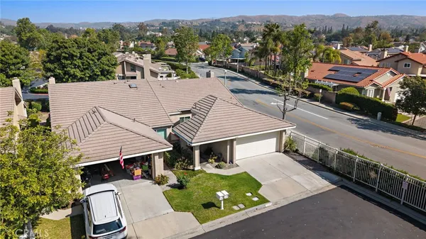 a view of a house with a garden