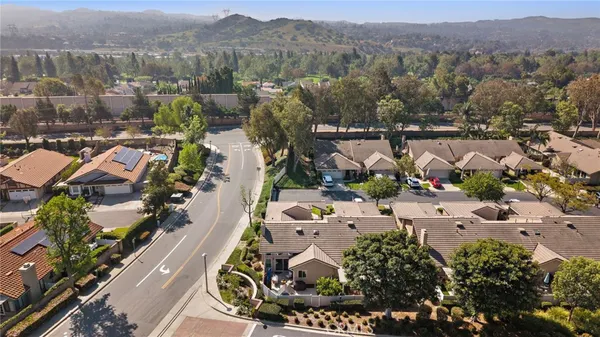 an aerial view of a city with lots of residential buildings