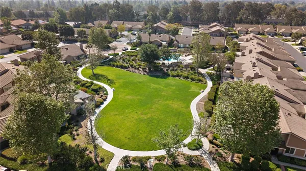 an aerial view of a swimming pool and outdoor space