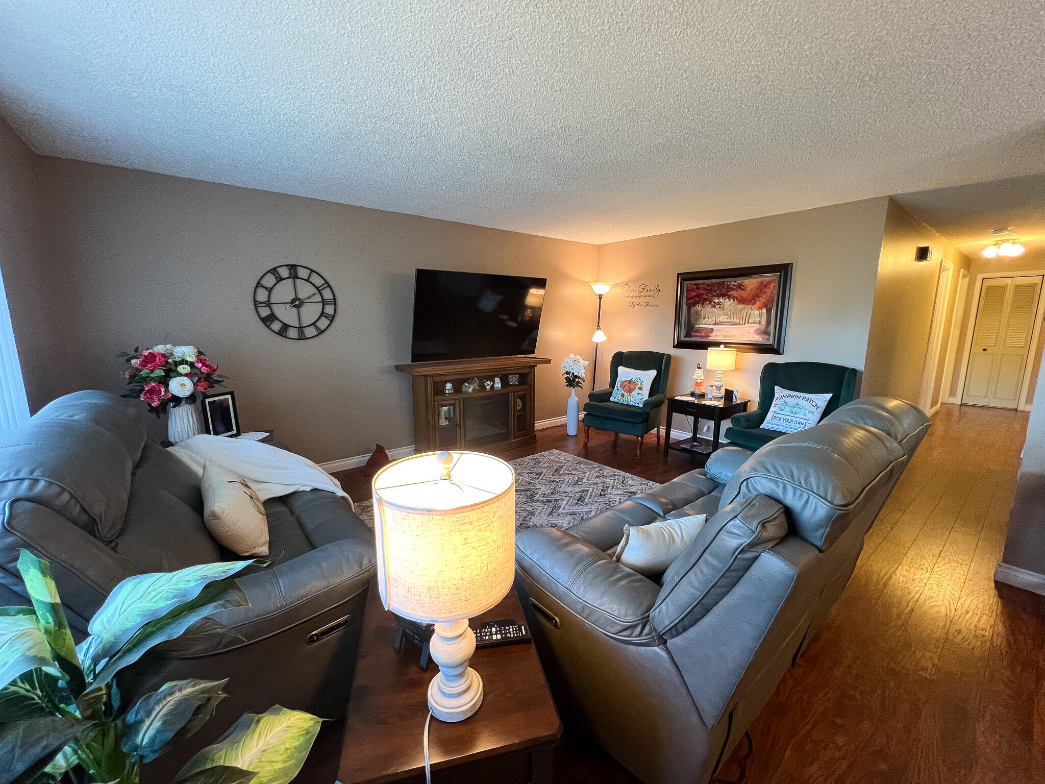 1225 East B Street Fossil, OR 97830 - Photo 4 of 33 a living room with furniture and a flat screen tv