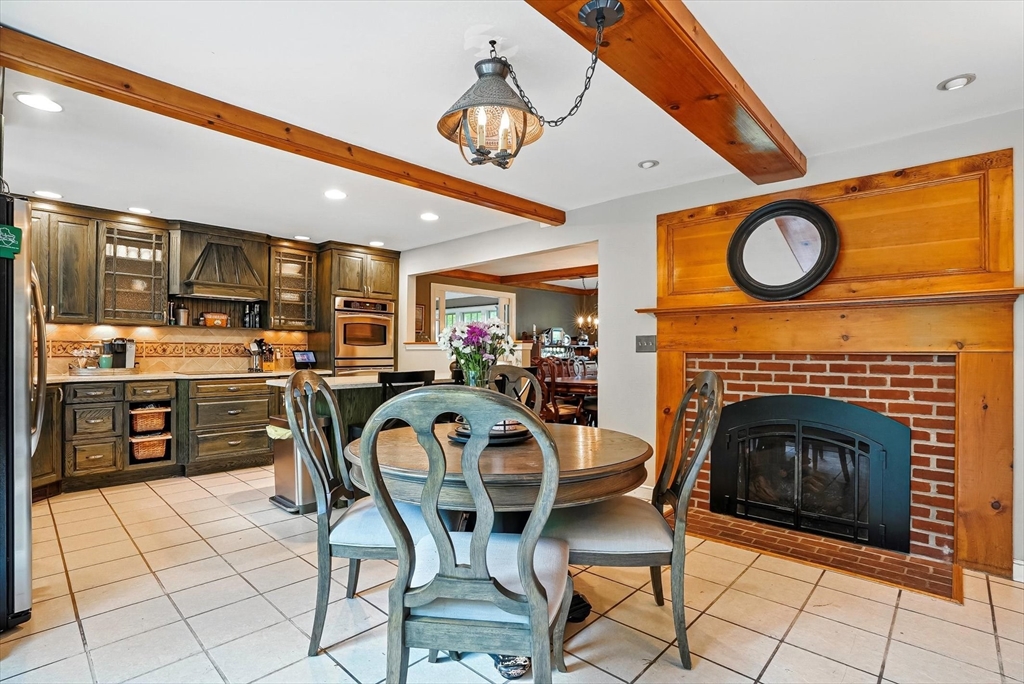 56 Grafton Road Upton, MA 01568 - Photo 13 of 34 a view of a kitchen and dining area