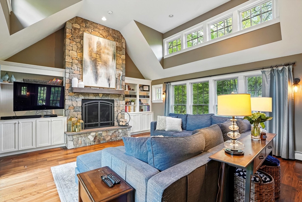 56 Grafton Road Upton, MA 01568 - Photo 15 of 34 a living room with furniture and a fireplace