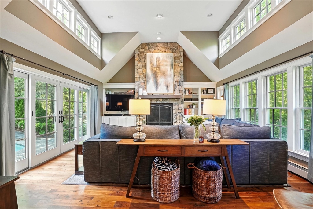 56 Grafton Road Upton, MA 01568 - Photo 16 of 34 a living room with furniture and large windows