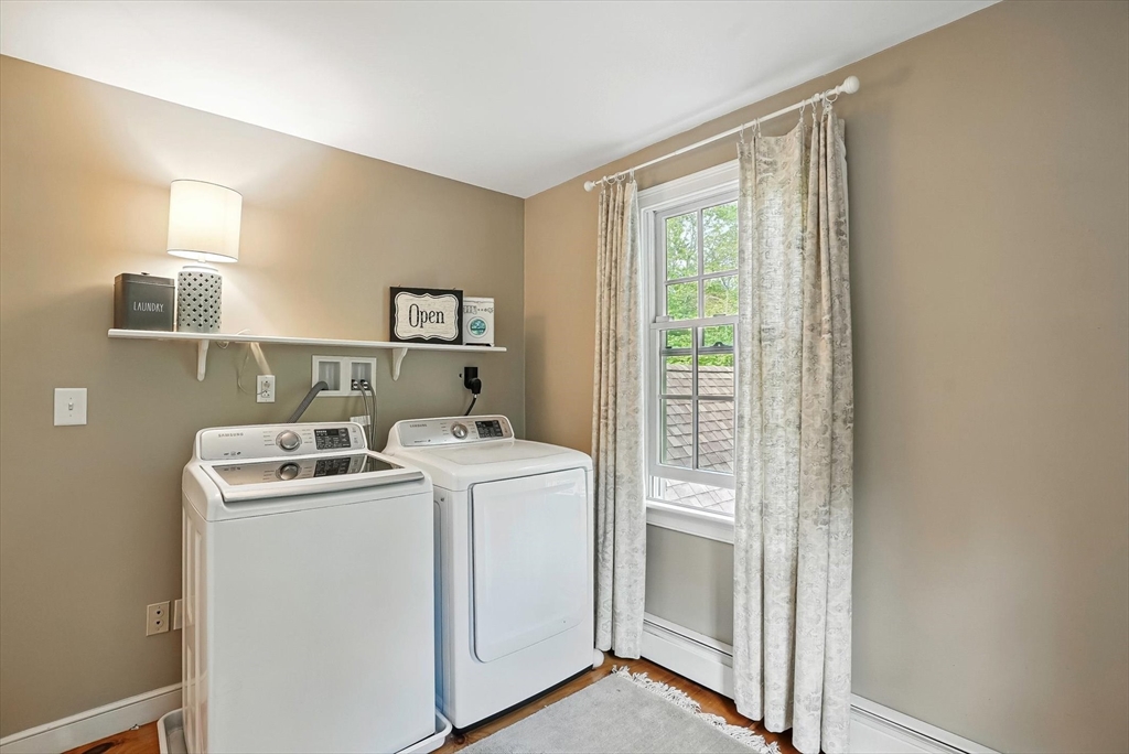 56 Grafton Road Upton, MA 01568 - Photo 18 of 34 a utility room with dryer and washer