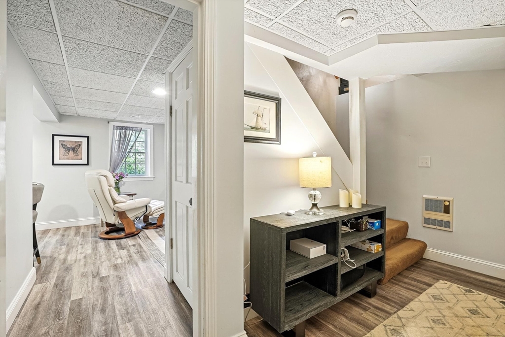 56 Grafton Road Upton, MA 01568 - Photo 27 of 34 a living room with furniture and a wooden floor
