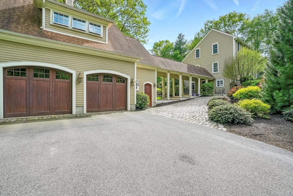 56 Grafton Road Upton, MA 01568 - Photo 3 of 34 front view of a house with a street