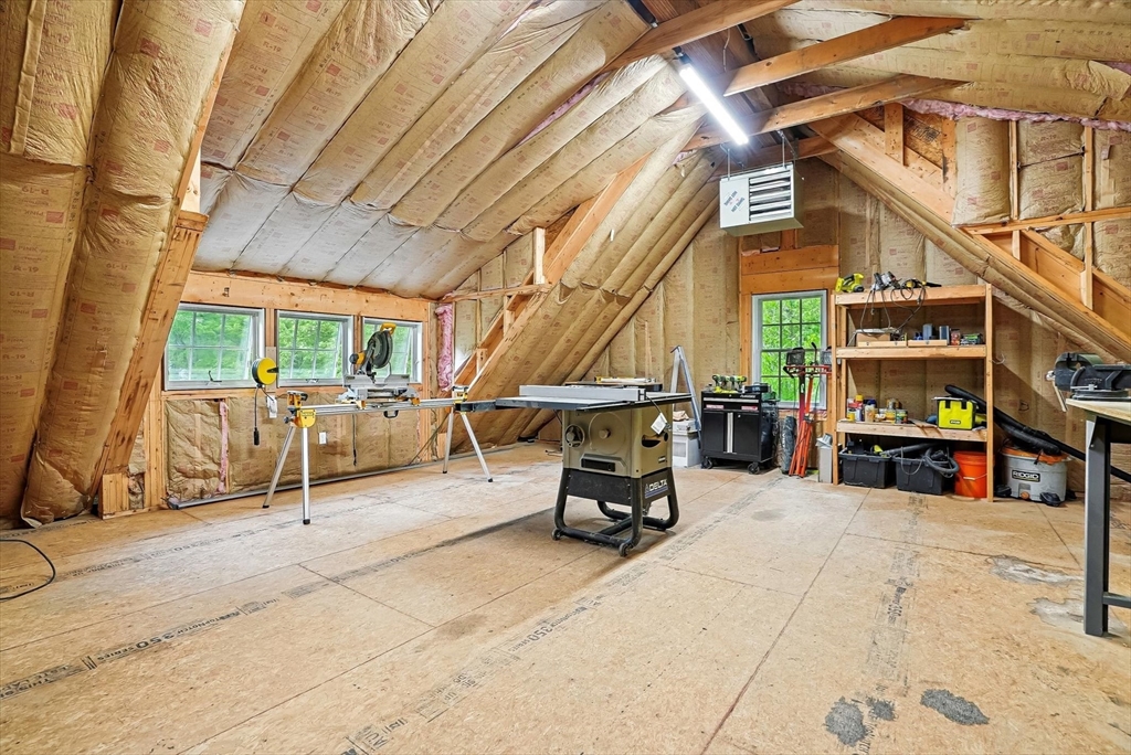 56 Grafton Road Upton, MA 01568 - Photo 33 of 34 a view of a patio with table and chairs