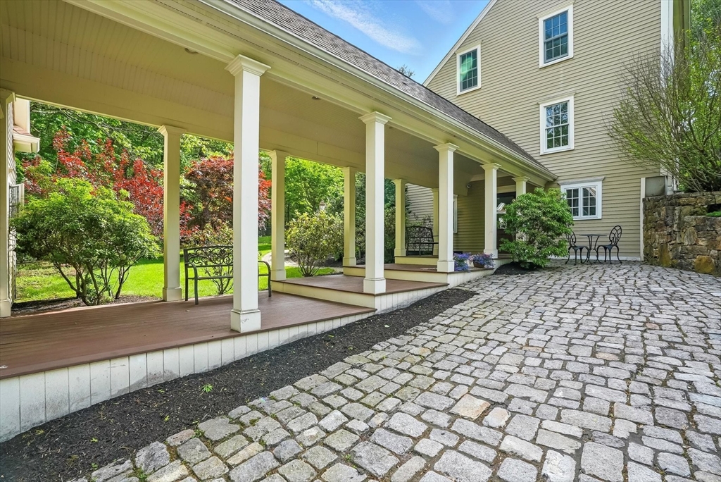 56 Grafton Road Upton, MA 01568 - Photo 4 of 34 a view of a house with a porch