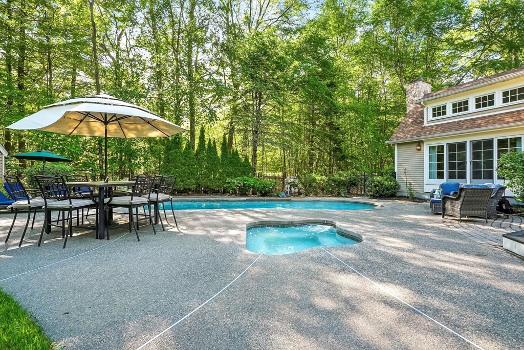 56 Grafton Road Upton, MA 01568 - Photo 7 of 34 a view of a house with backyard porch and sitting area