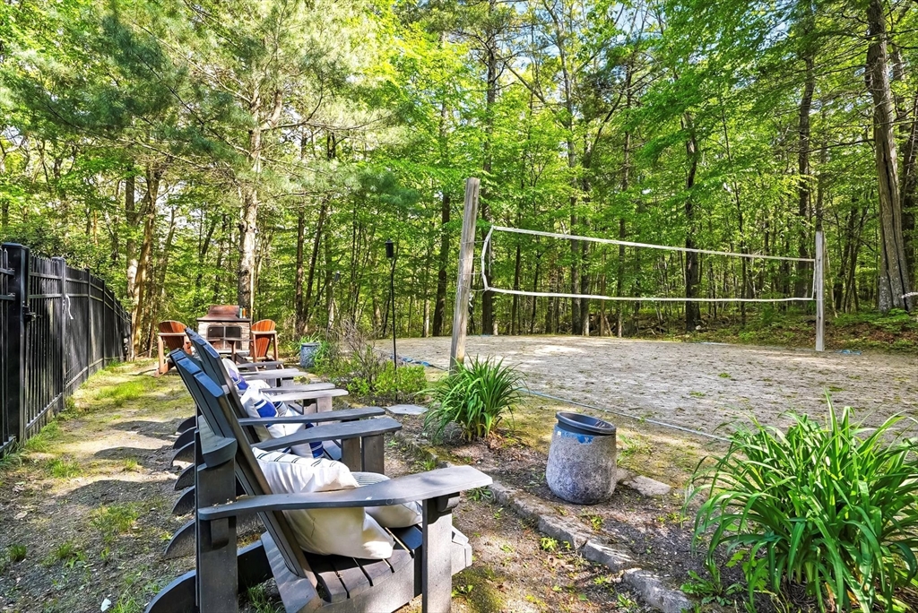 56 Grafton Road Upton, MA 01568 - Photo 9 of 34 a view of a chairs and table in the garden