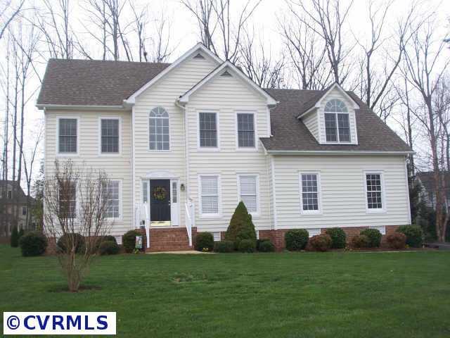 1130 Goswick Ridge Road Midlothian, VA 23114 - Photo 1 of 10 a front view of a house with a garden