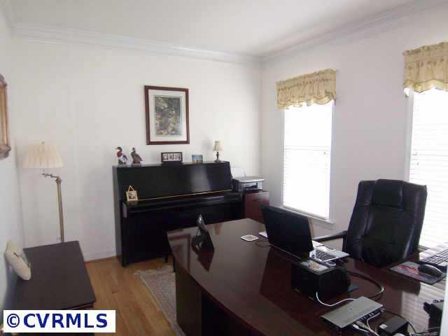 1130 Goswick Ridge Road Midlothian, VA 23114 - Photo 4 of 10 a view of a workspace with furniture and a window