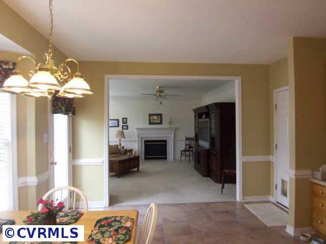 1130 Goswick Ridge Road Midlothian, VA 23114 - Photo 6 of 10 a view of a livingroom with a fireplace