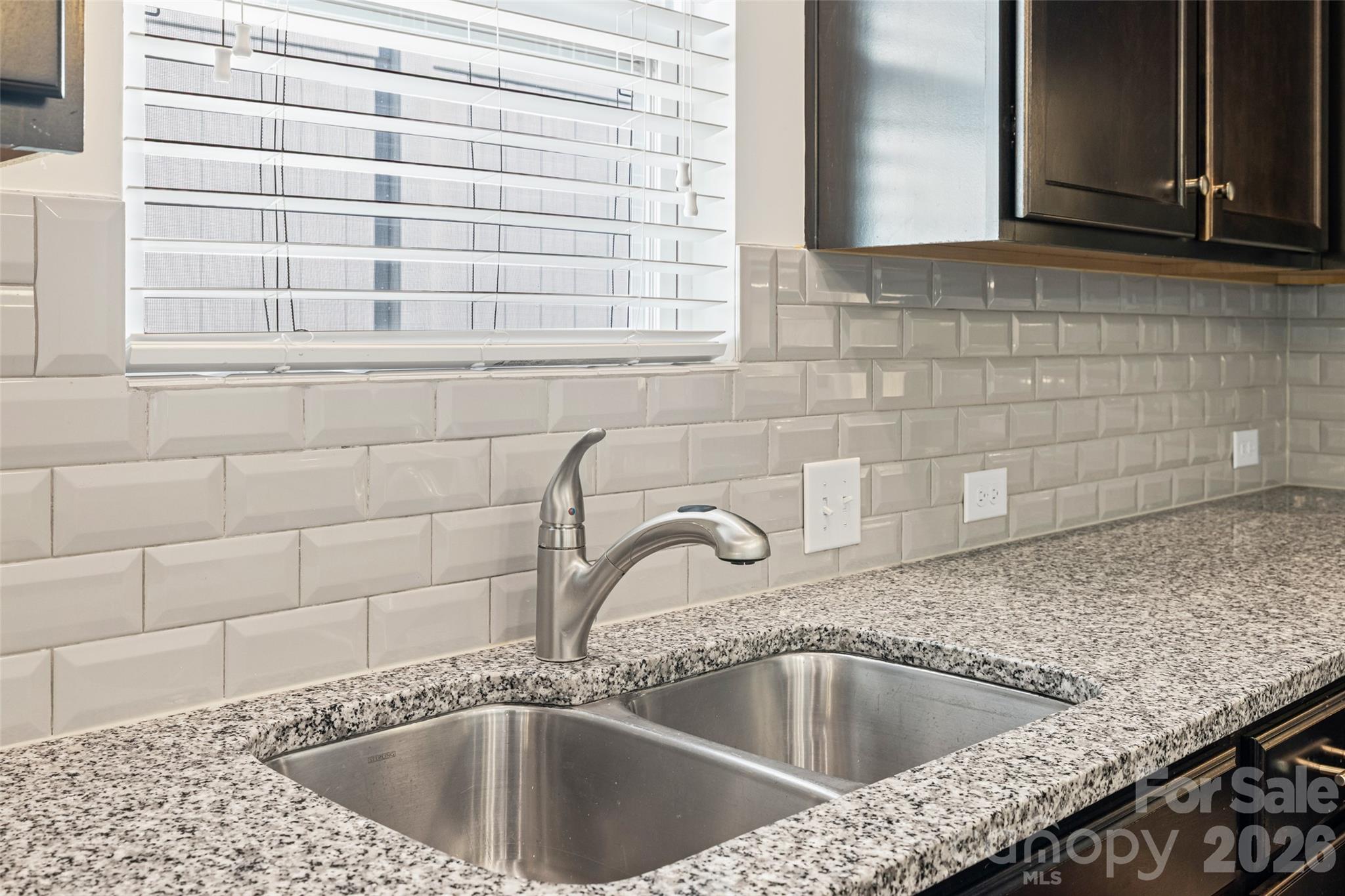 1214 Brookcrest Lane Fort Mill, SC 29708 - Photo 13 of 41 a kitchen with a sink and granite