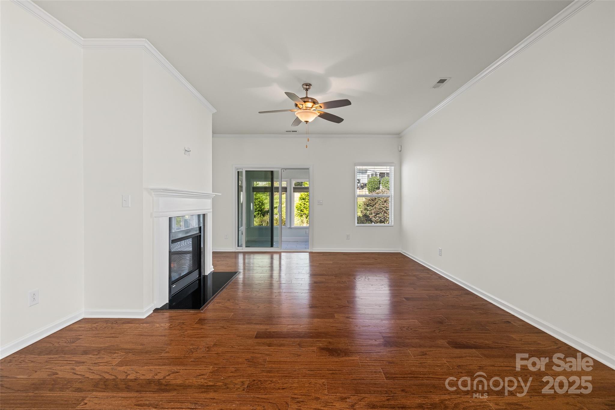 1214 Brookcrest Lane Fort Mill, SC 29708 - Photo 14 of 41 wooden floor in an empty room with a window