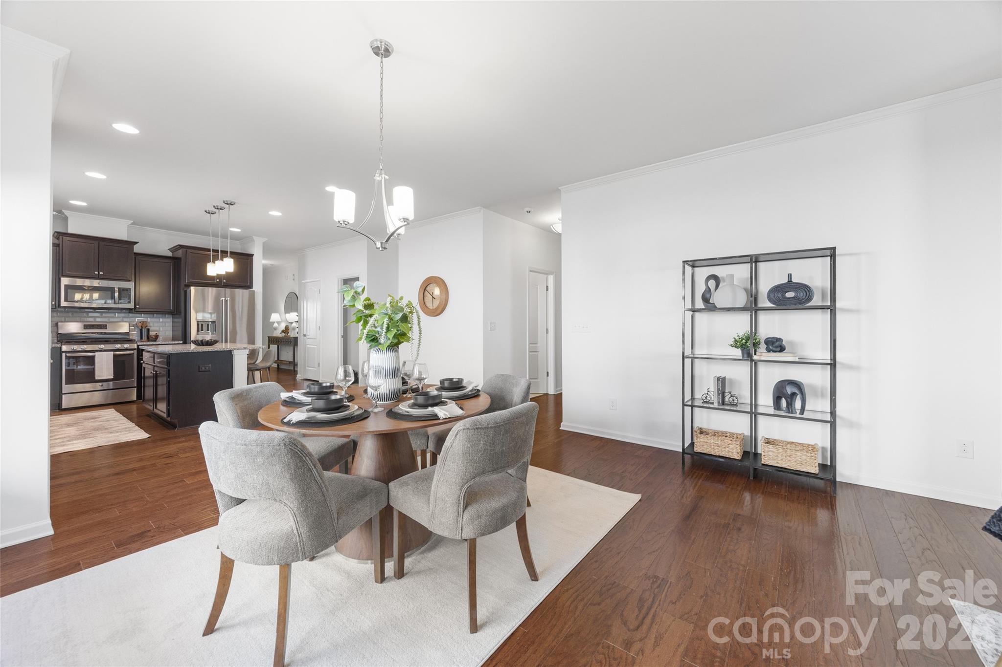 1214 Brookcrest Lane Fort Mill, SC 29708 - Photo 17 of 41 a view of a dining room with furniture window and wooden floor
