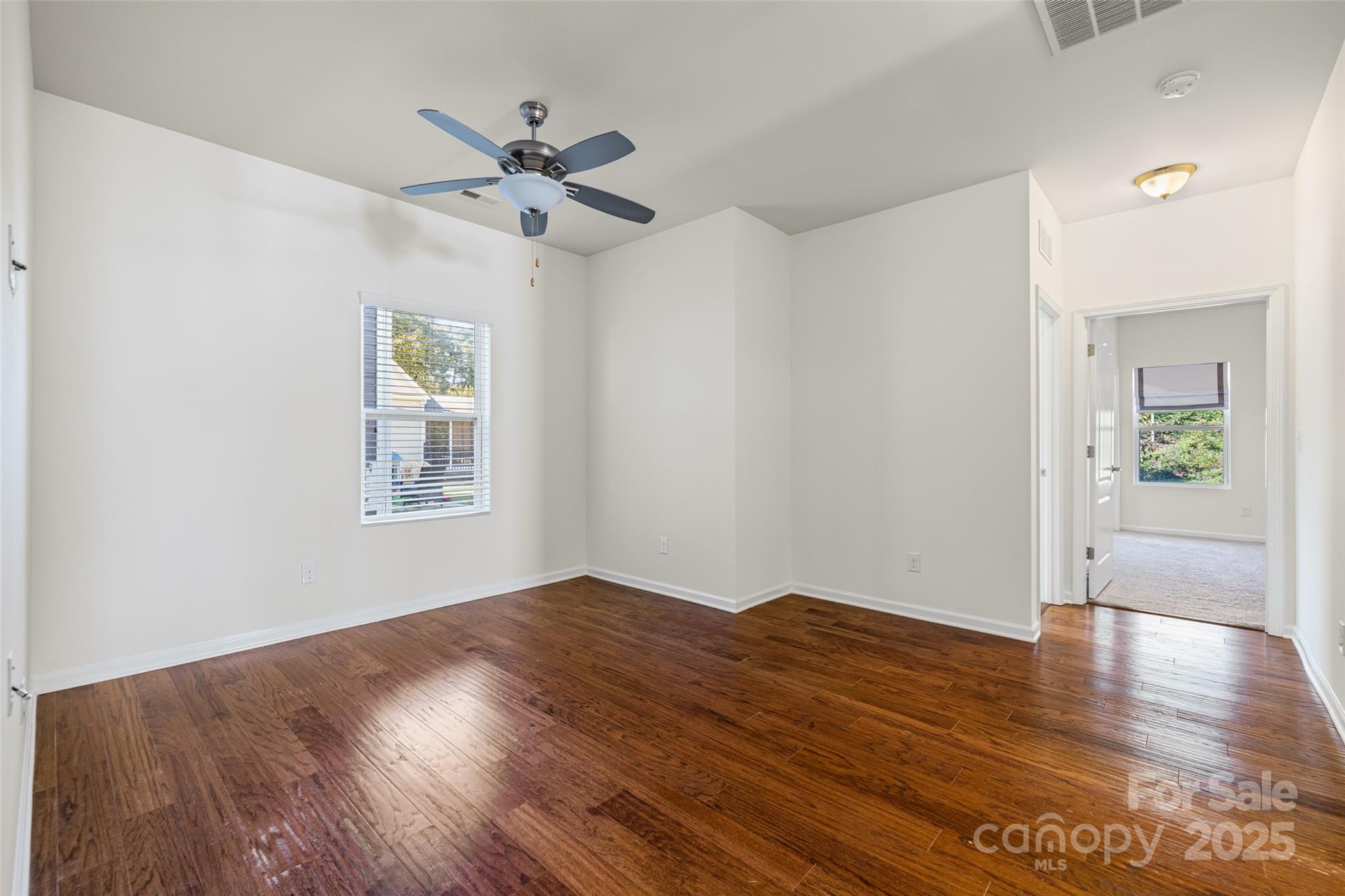 1214 Brookcrest Lane Fort Mill, SC 29708 - Photo 20 of 41 wooden floor in an empty room with a window