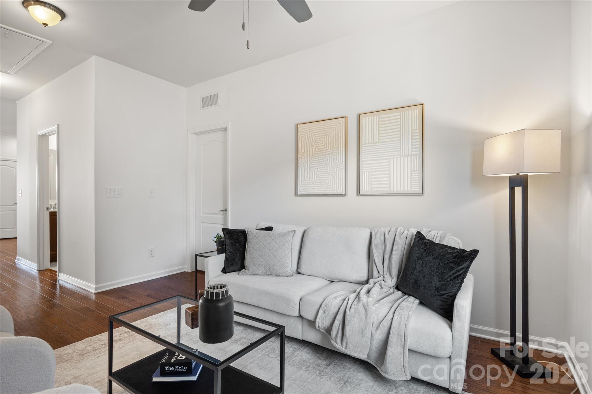 1214 Brookcrest Lane Fort Mill, SC 29708 - Photo 22 of 41 a living room with furniture and wooden floor