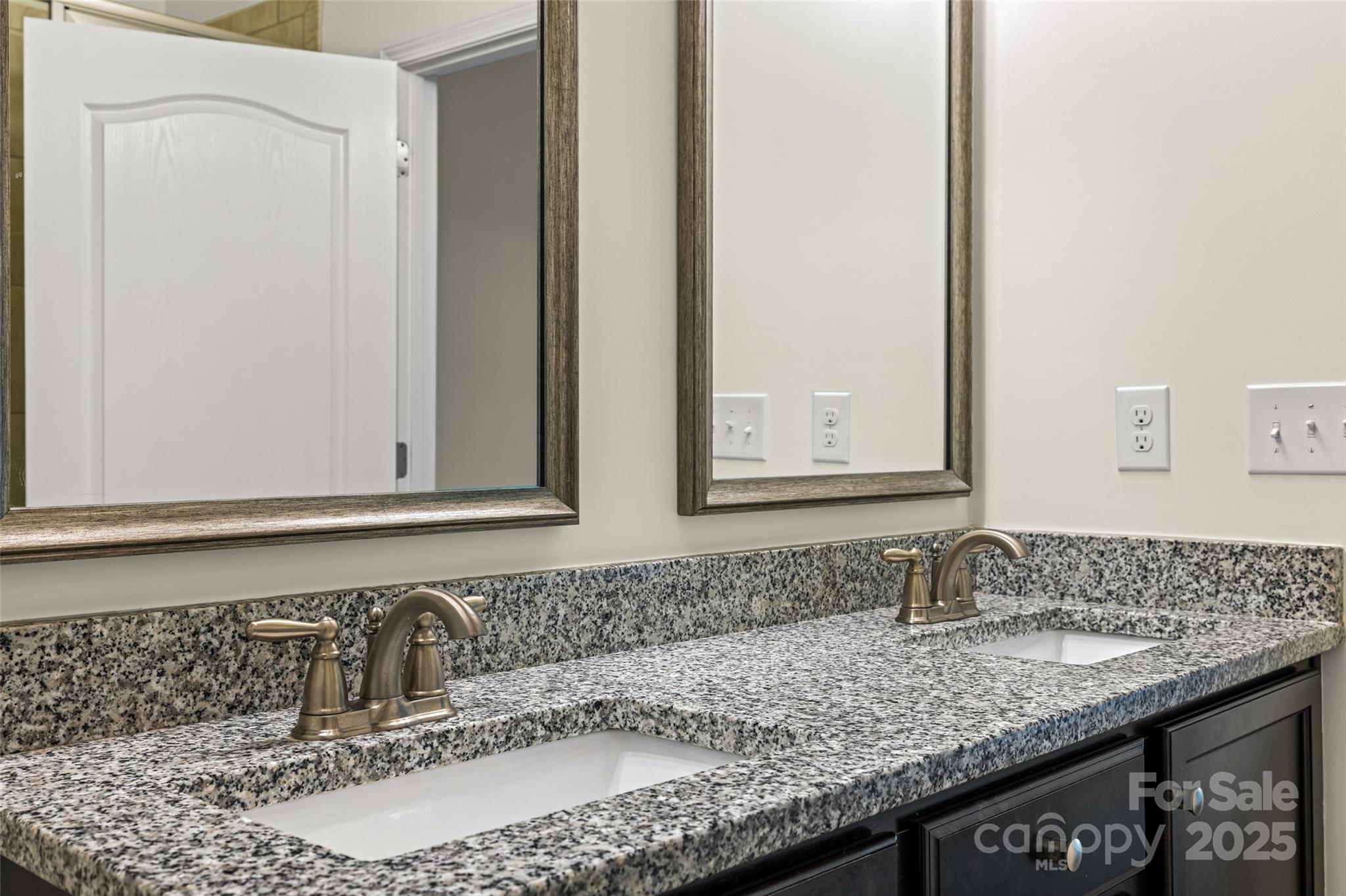 1214 Brookcrest Lane Fort Mill, SC 29708 - Photo 25 of 41 a bathroom with a granite countertop sink and a mirror