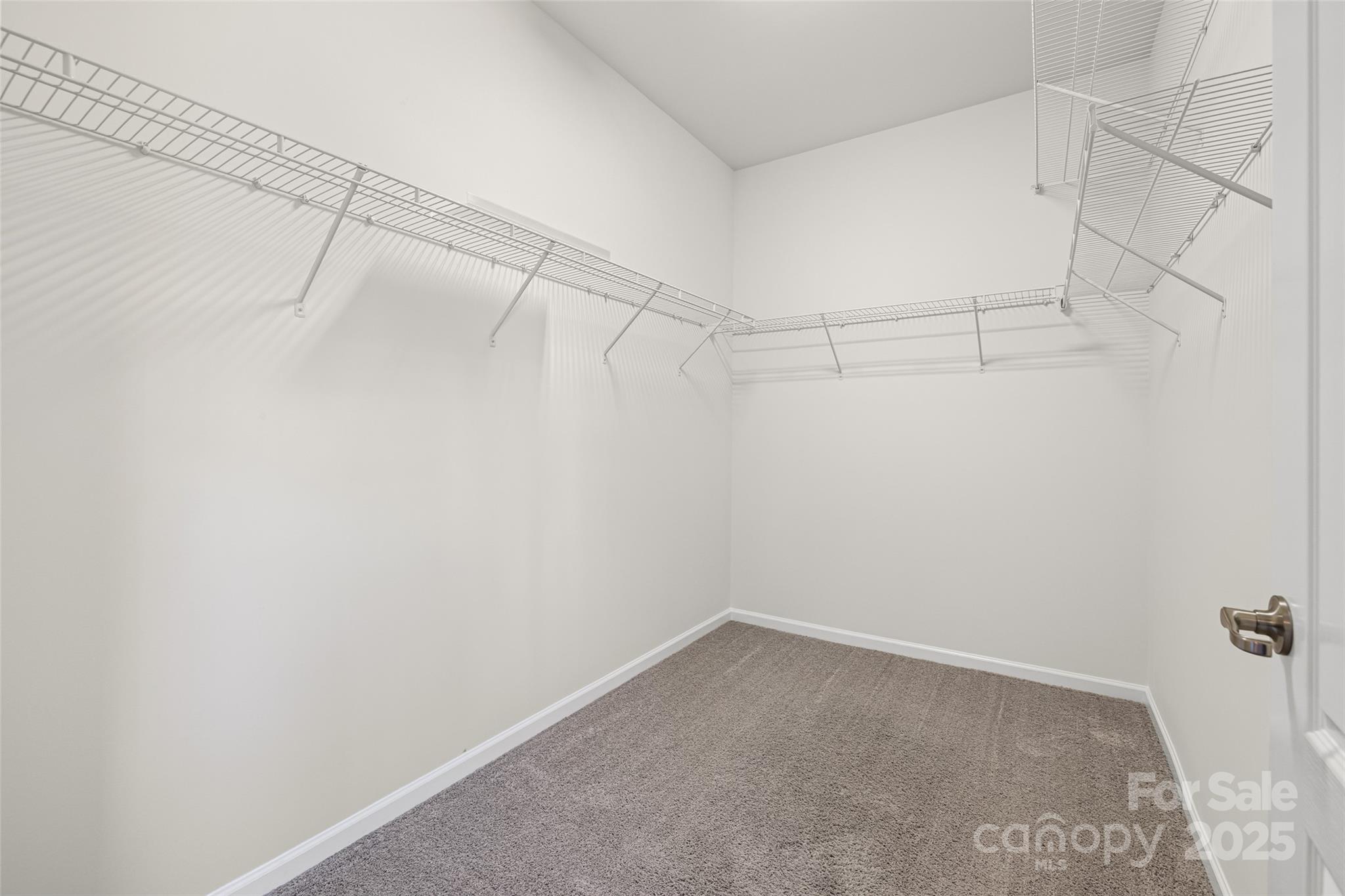1214 Brookcrest Lane Fort Mill, SC 29708 - Photo 27 of 41 a view of a room with racks on the wall