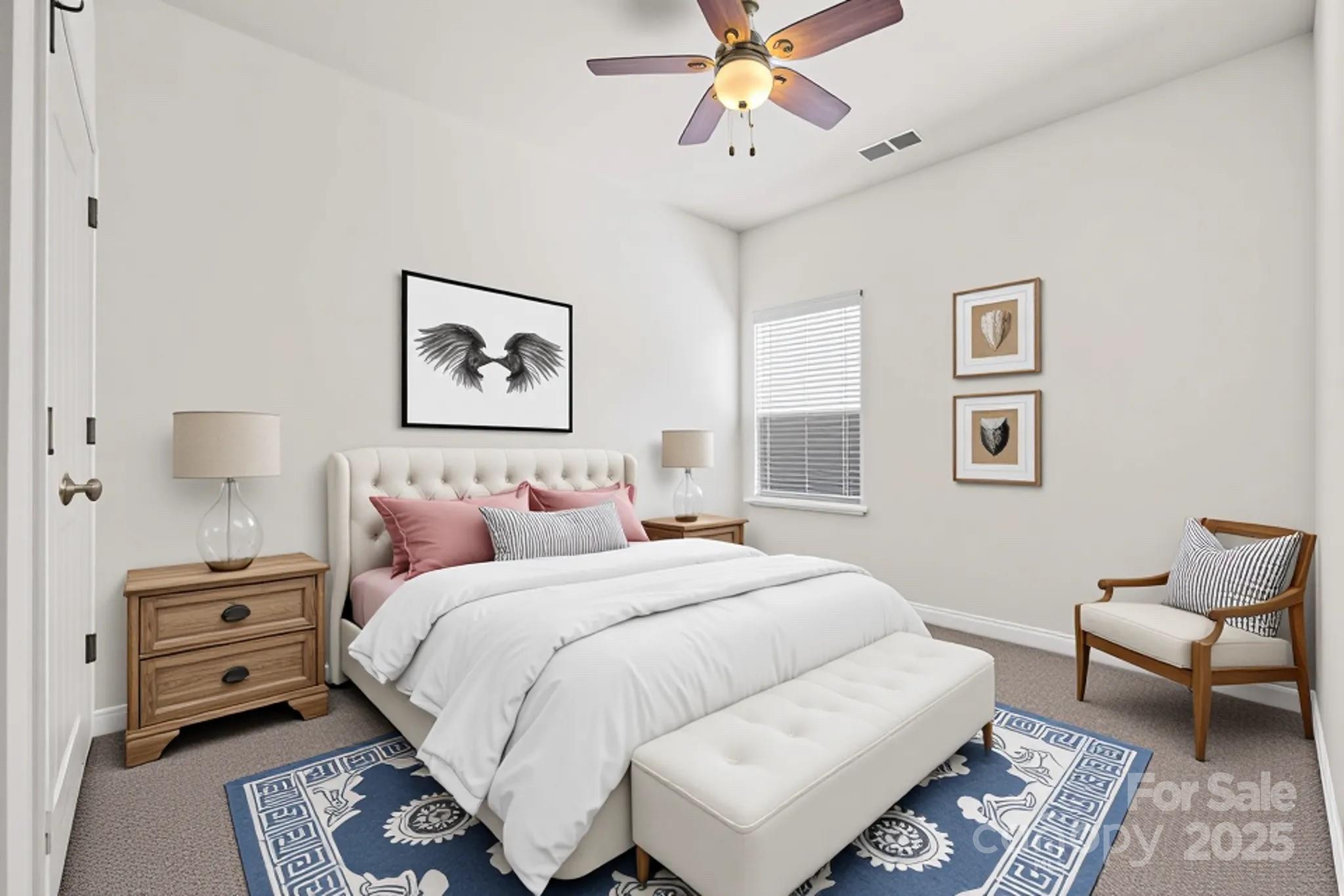 1214 Brookcrest Lane Fort Mill, SC 29708 - Photo 30 of 41 a bedroom with a bed and a couch