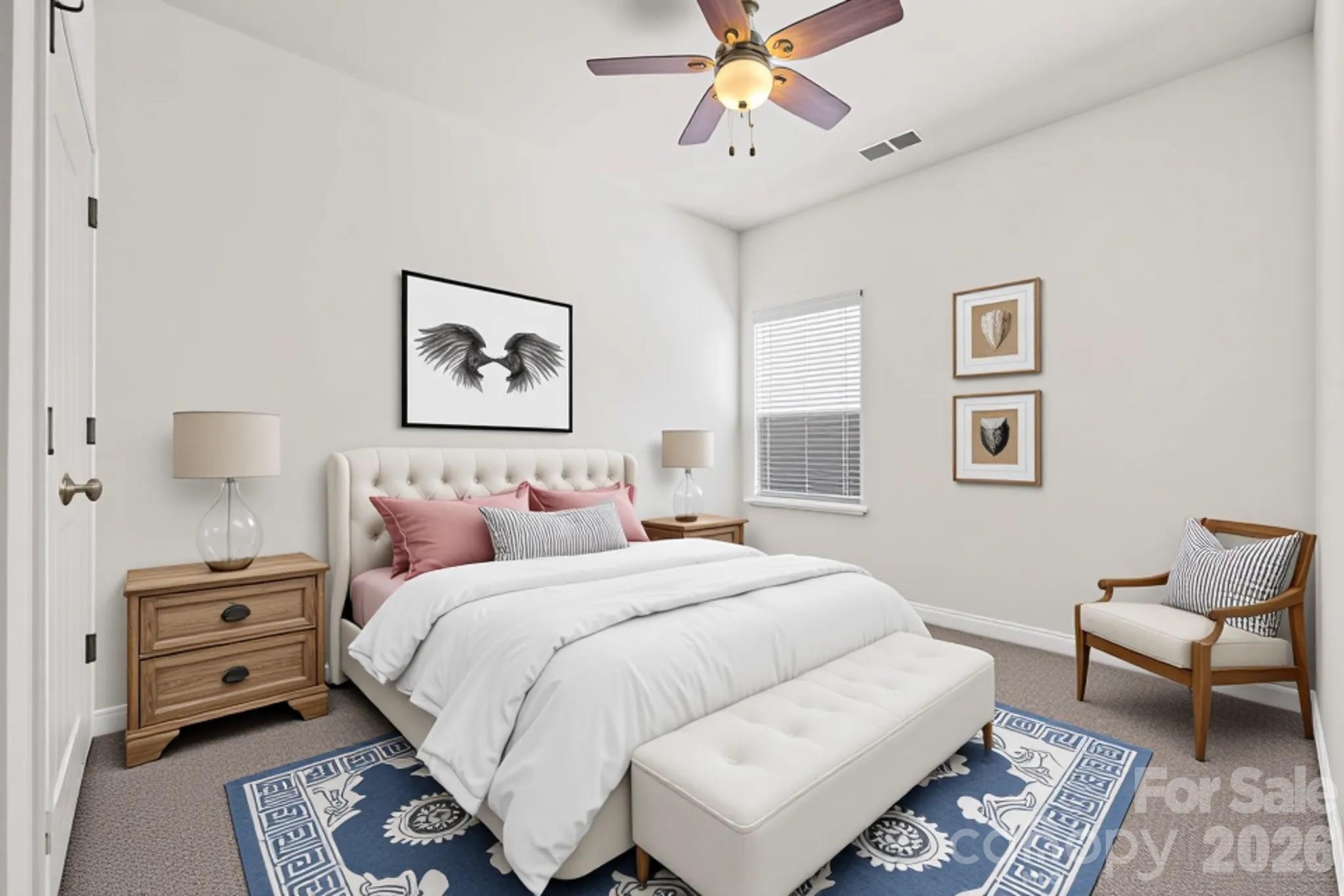 1214 Brookcrest Lane Fort Mill, SC 29708 - Photo 31 of 41 a bedroom with a bed and a couch