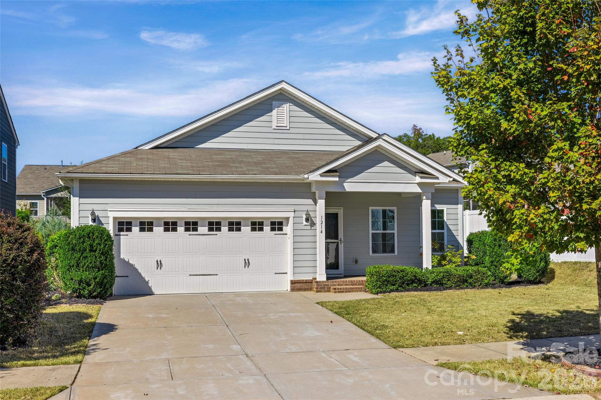 1214 Brookcrest Lane Fort Mill, SC 29708 - Photo 41 of 41 a front view of a house with a yard and garage