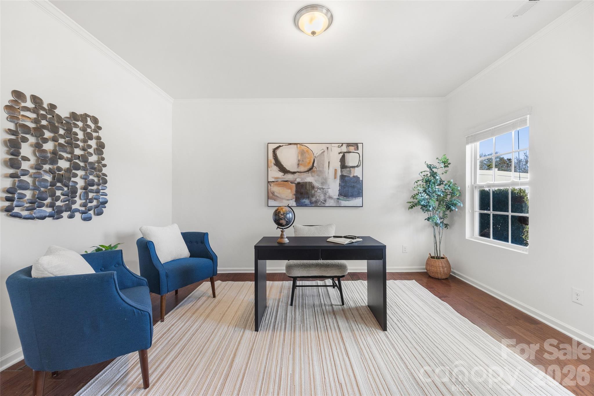 1214 Brookcrest Lane Fort Mill, SC 29708 - Photo 5 of 41 a view of a livingroom with furniture and wooden floor