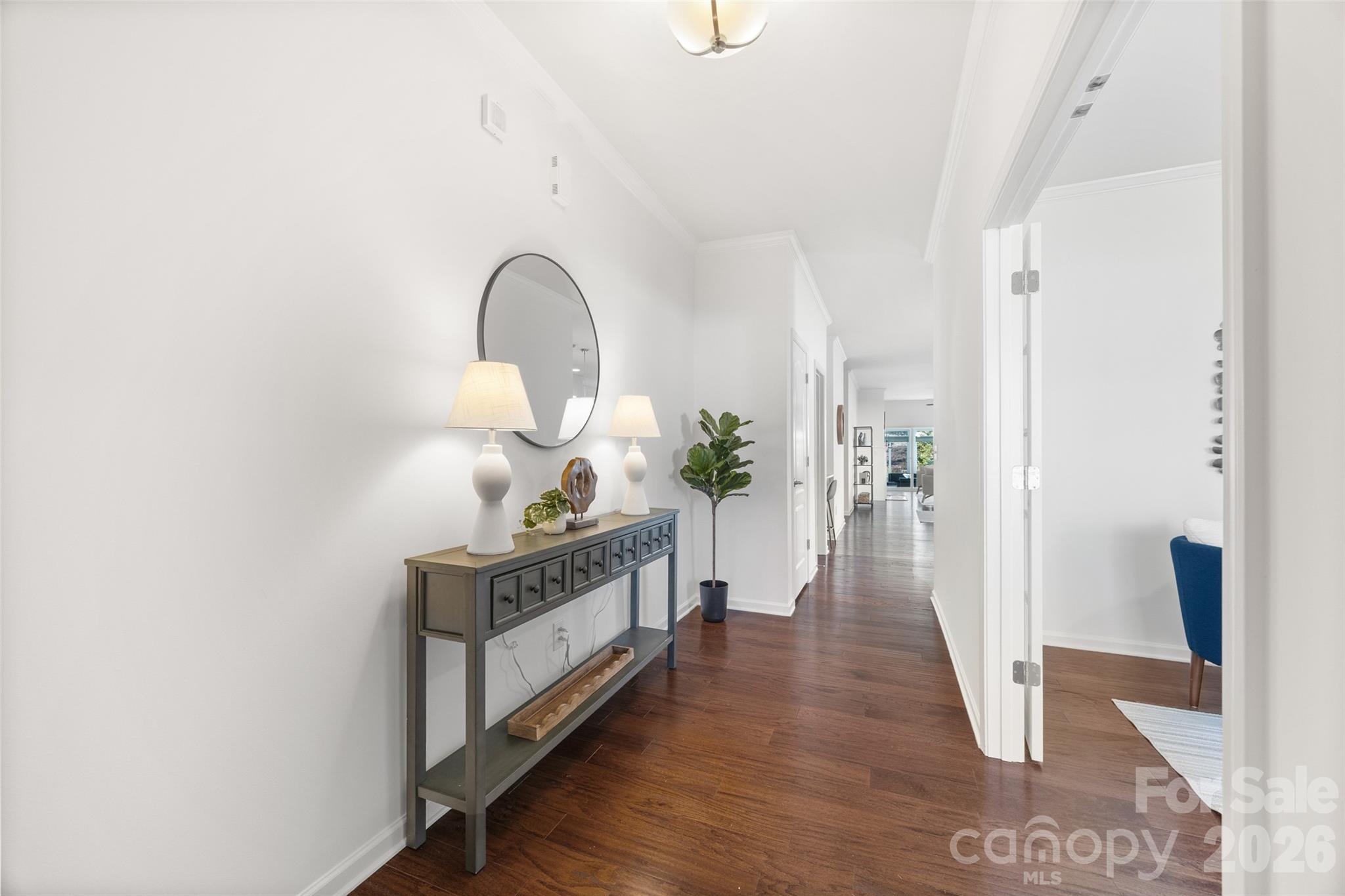 1214 Brookcrest Lane Fort Mill, SC 29708 - Photo 8 of 41 a view of a hallway with wooden floor