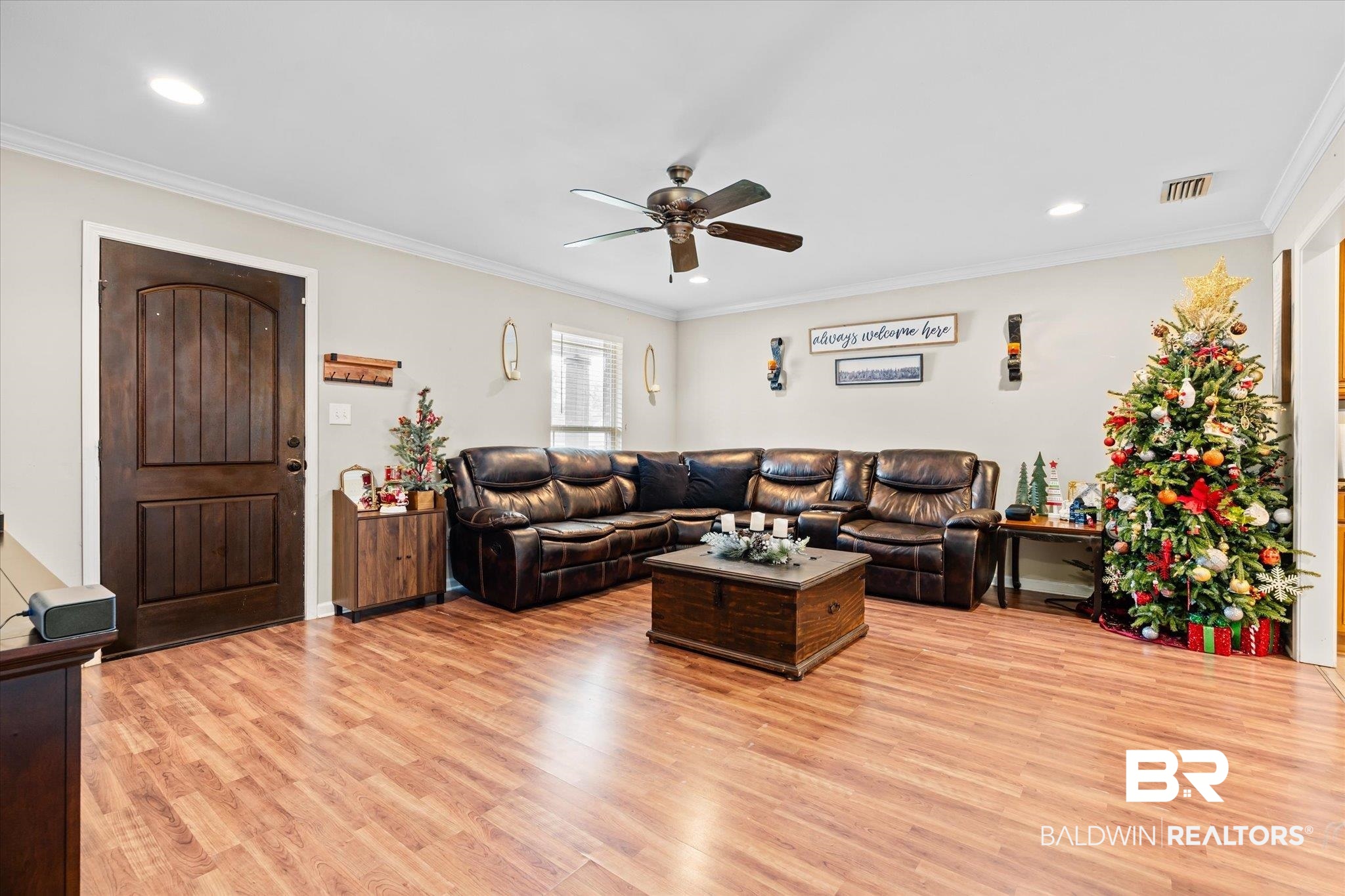2855 Rebecca Drive West Mobile, AL 36618 - Photo 3 of 22 Living room featuring crown molding, ceiling fan, and light hardwood / wood-style floors