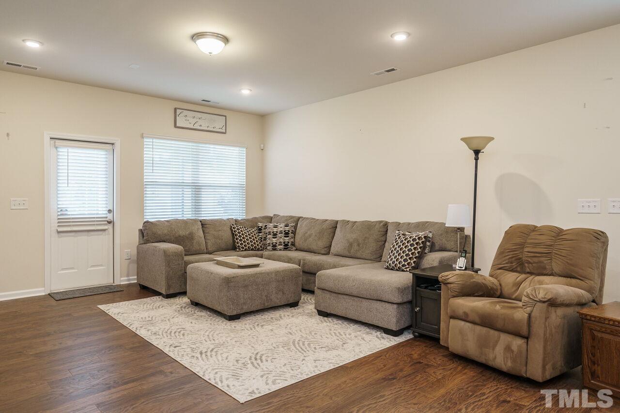 4100 Catfish Wy. Durham, NC 27703 - Photo 13 of 29 a living room with furniture and a window