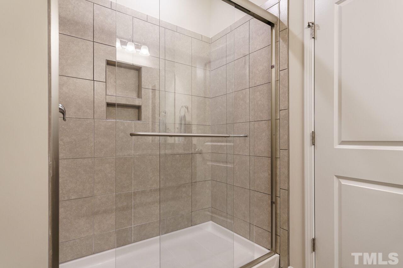 4100 Catfish Wy. Durham, NC 27703 - Photo 20 of 29 a bathroom with a shower