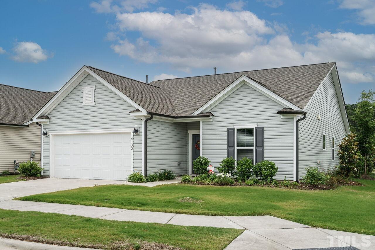 4100 Catfish Wy. Durham, NC 27703 - Photo 2 of 29 a front view of house with yard and green space
