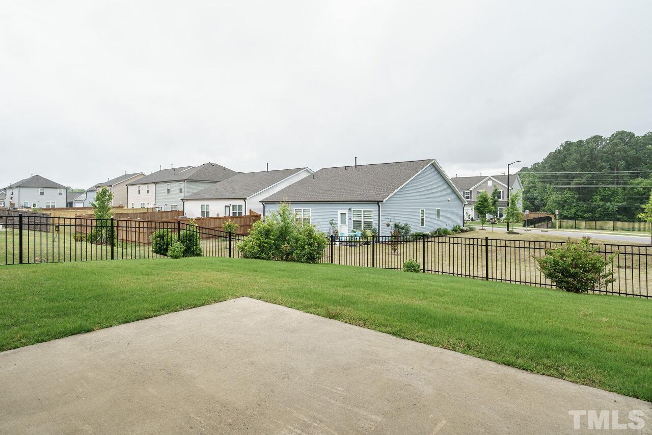 4100 Catfish Wy. Durham, NC 27703 - Photo 25 of 29 a view of an house with backyard and garden