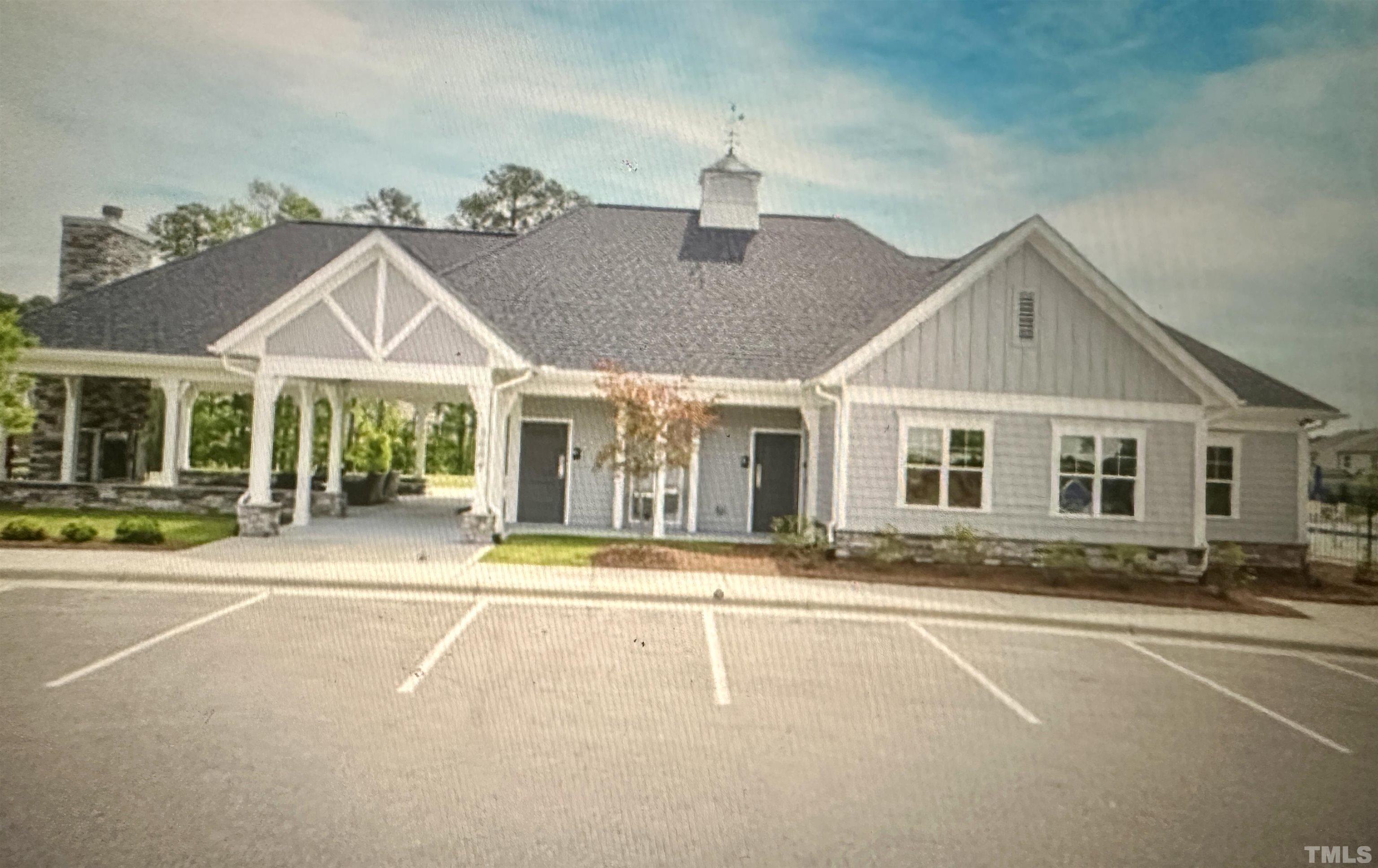 4100 Catfish Wy. Durham, NC 27703 - Photo 28 of 29 a front view of a house with a yard