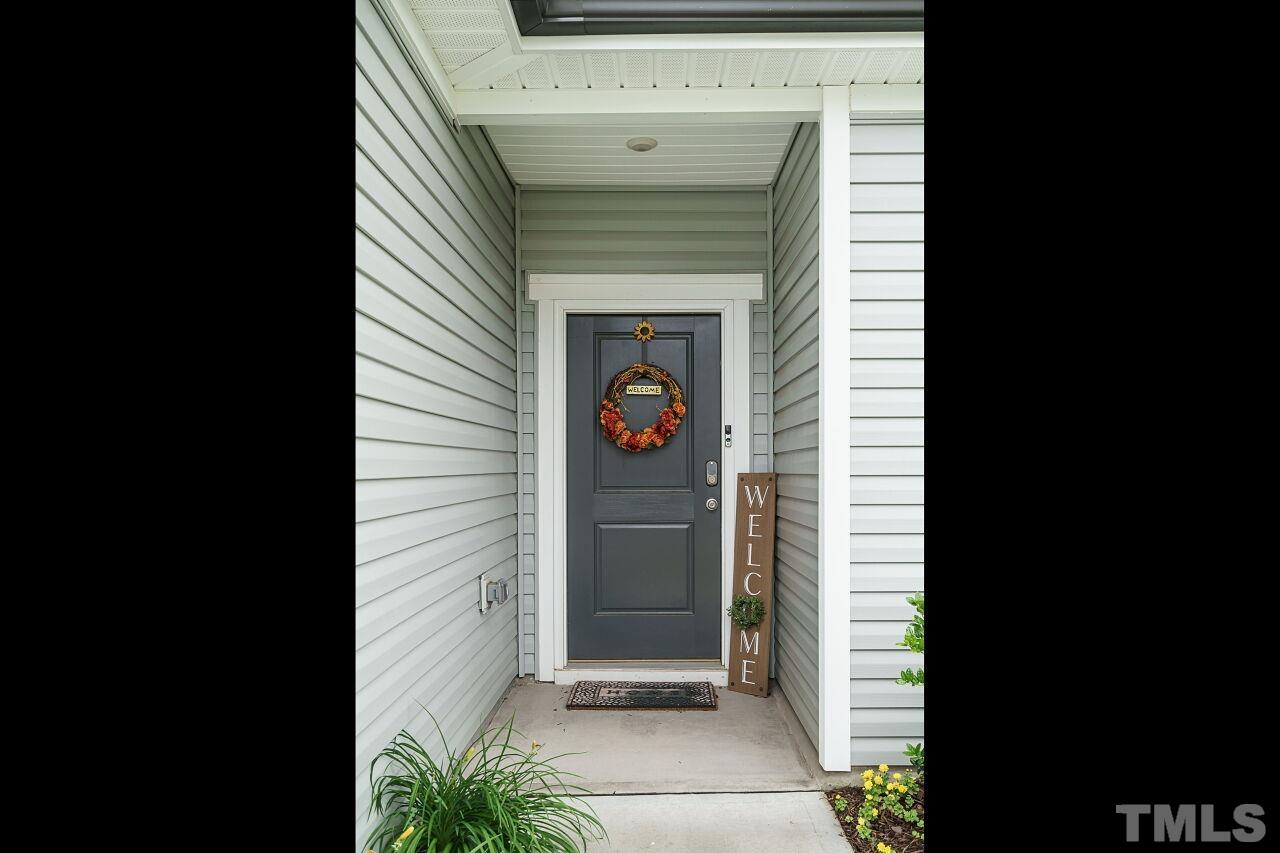 4100 Catfish Wy. Durham, NC 27703 - Photo 3 of 29 a view of a entryway door of the house