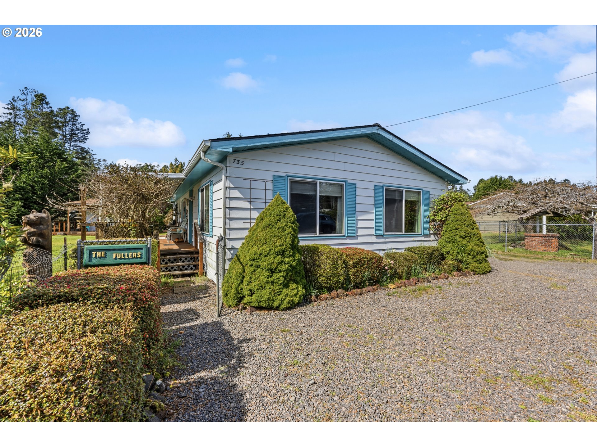 735 North 8th Street Lakeside, OR 97449 - Photo 3 of 45 a house view with a garden space
