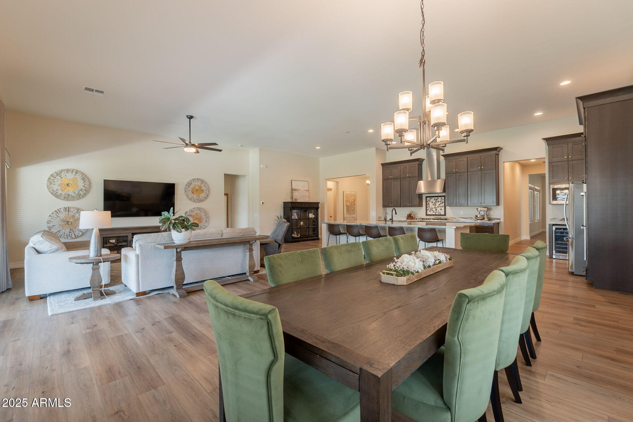 22863 East Russet Road Queen Creek, AZ 85142 - Photo 15 of 77 a view of a dining room with furniture and wooden floor
