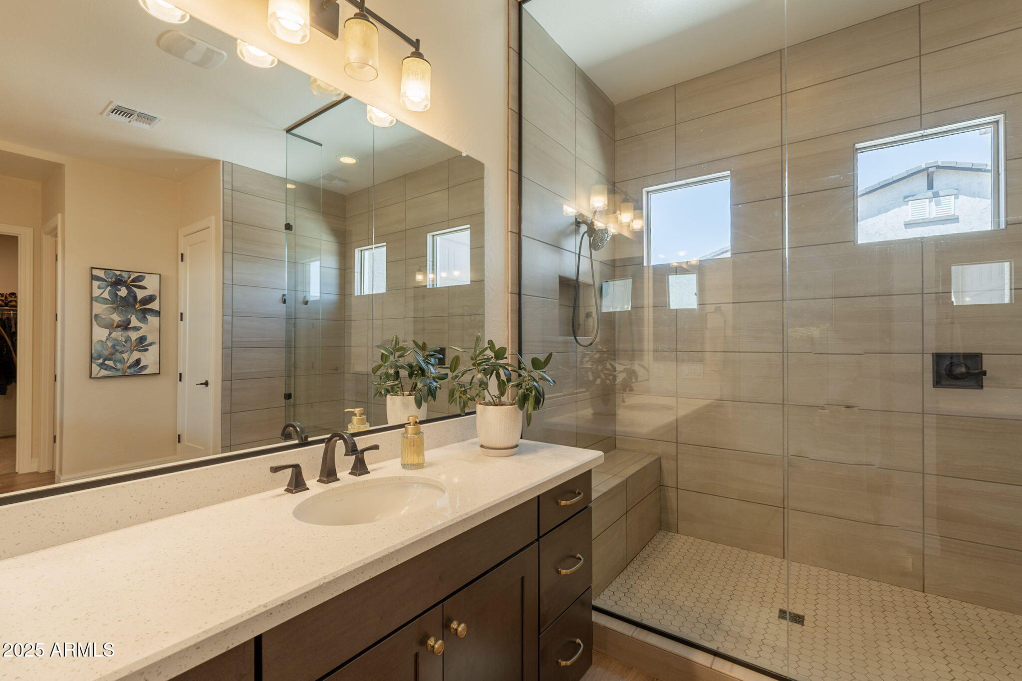 22863 East Russet Road Queen Creek, AZ 85142 - Photo 36 of 77 a bathroom with a sink shower and a mirror