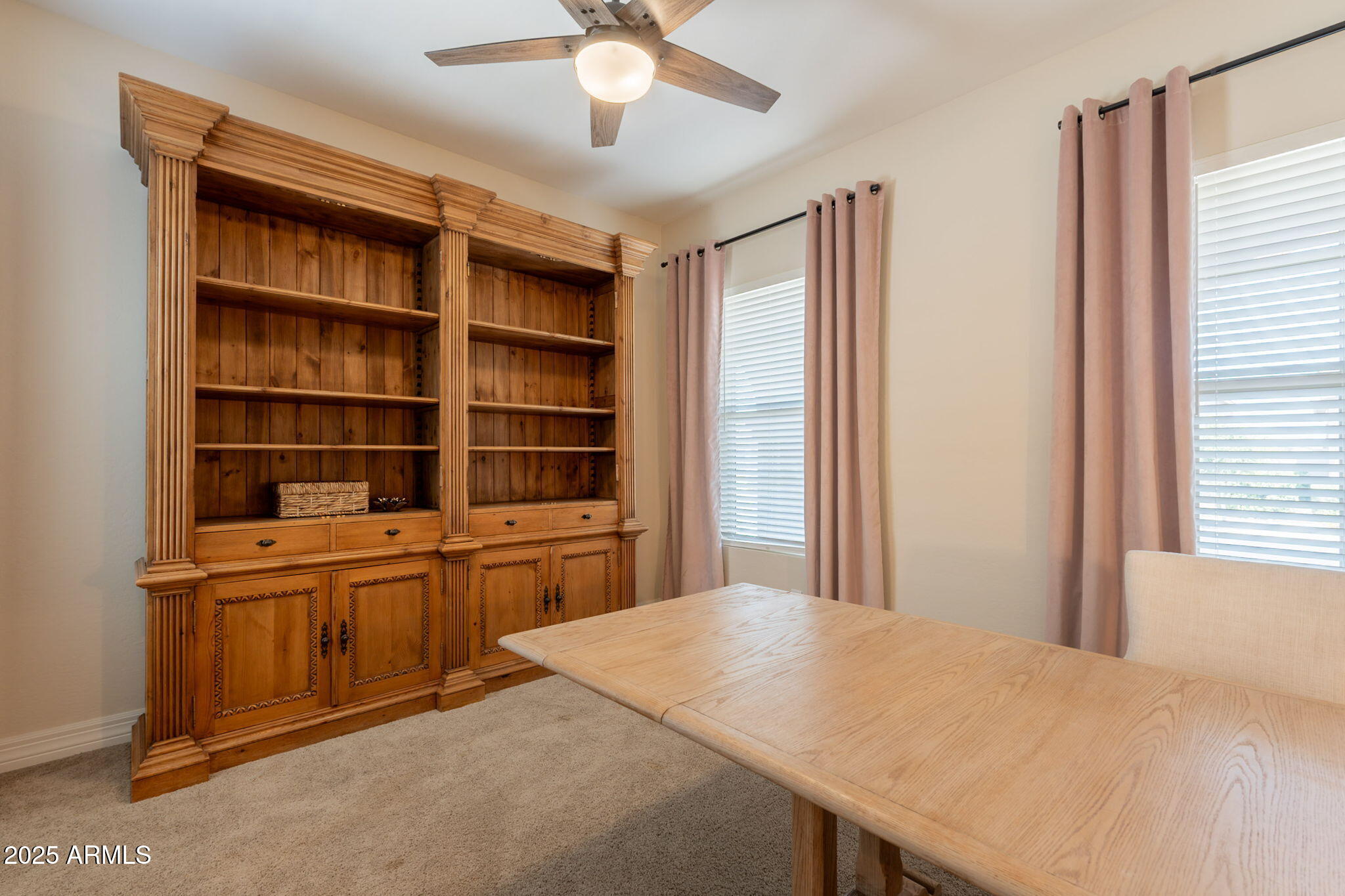 22863 East Russet Road Queen Creek, AZ 85142 - Photo 41 of 77 a bedroom with a large bed and a window