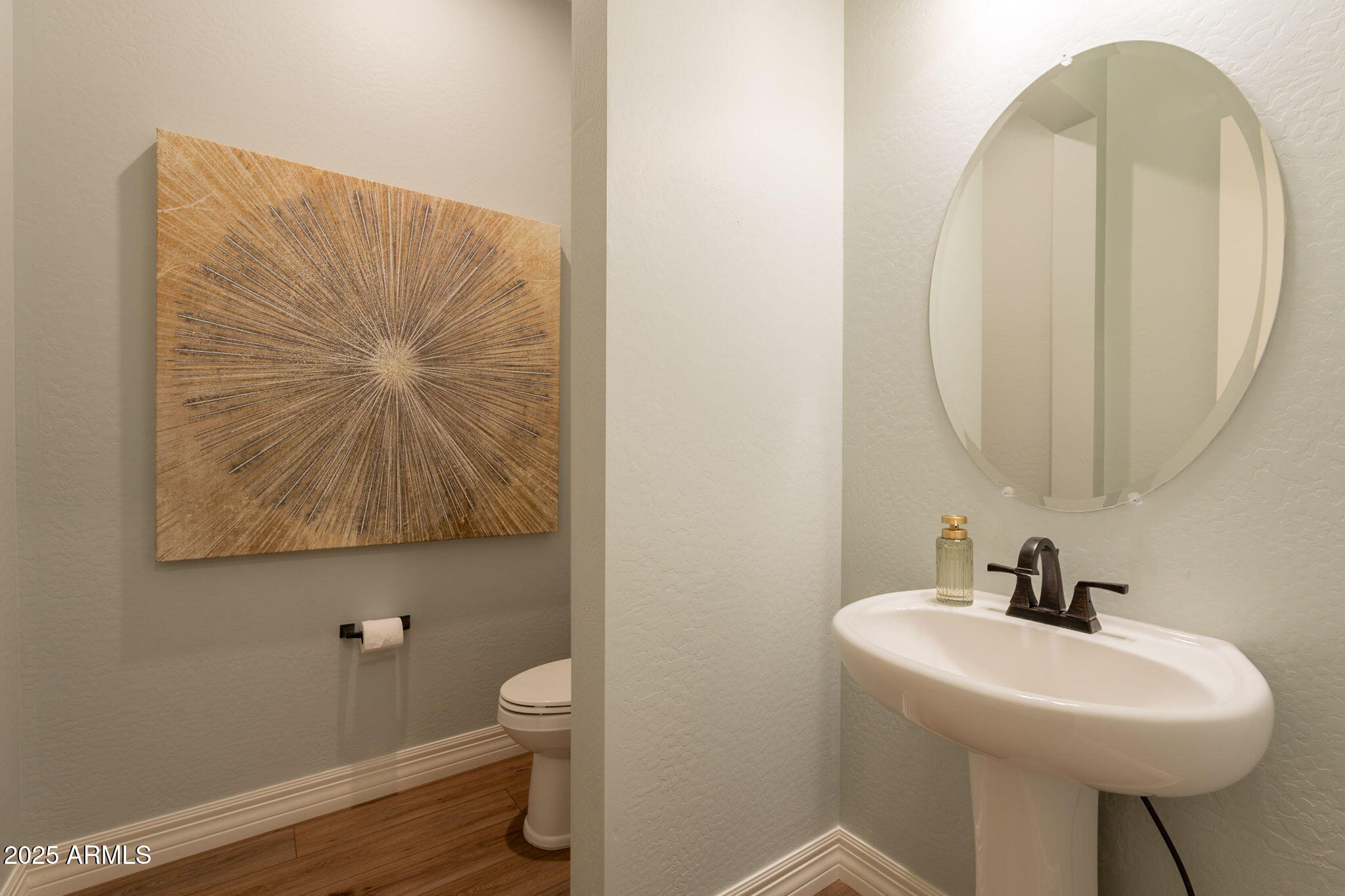 22863 East Russet Road Queen Creek, AZ 85142 - Photo 49 of 77 a bathroom with a toilet sink and mirror