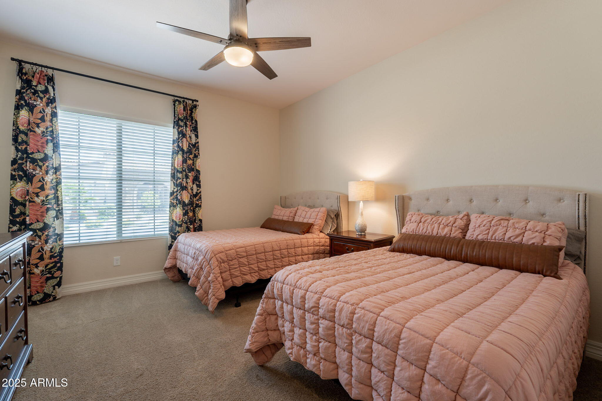 22863 East Russet Road Queen Creek, AZ 85142 - Photo 50 of 77 a bedroom with two beds and windows