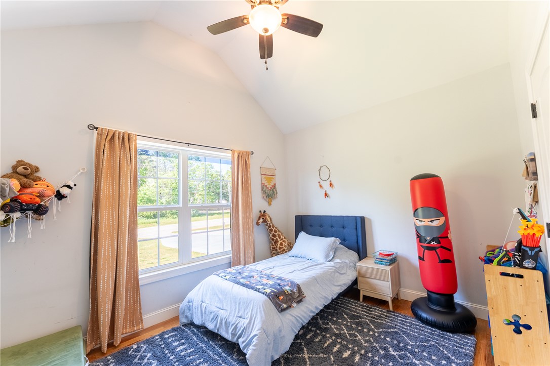 696 Mt Olivet Road Six Mile, SC 29682 - Photo 14 of 35 This airy bedroom features high ceilings and a refreshing ceiling fan for optimal comfort.