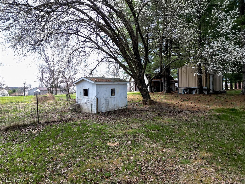 1502 Stone Quarry Road Fleming, OH 45729 - Photo 25 of 31 View of yard with a shed